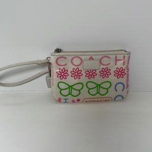 COACH “Multi Graffiti F42621” Flowers Hearts Stars Butterfly White Wristlet